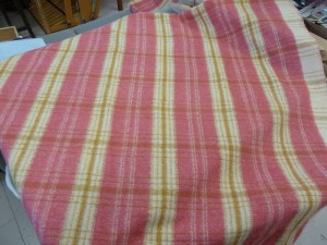 The rose blanket before cutting into strips