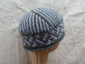 2 hats in 2 sizes using Cascade Handpaint & light blue Kid Classic  