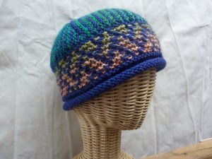 Noro Silk Garden (the same color and dyelot as above) / blue mix Cascade 220