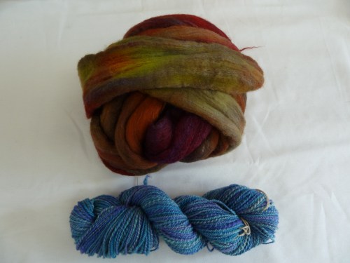 Polwarth/Silk roving dyed at camp. one finished and one yet to be spun